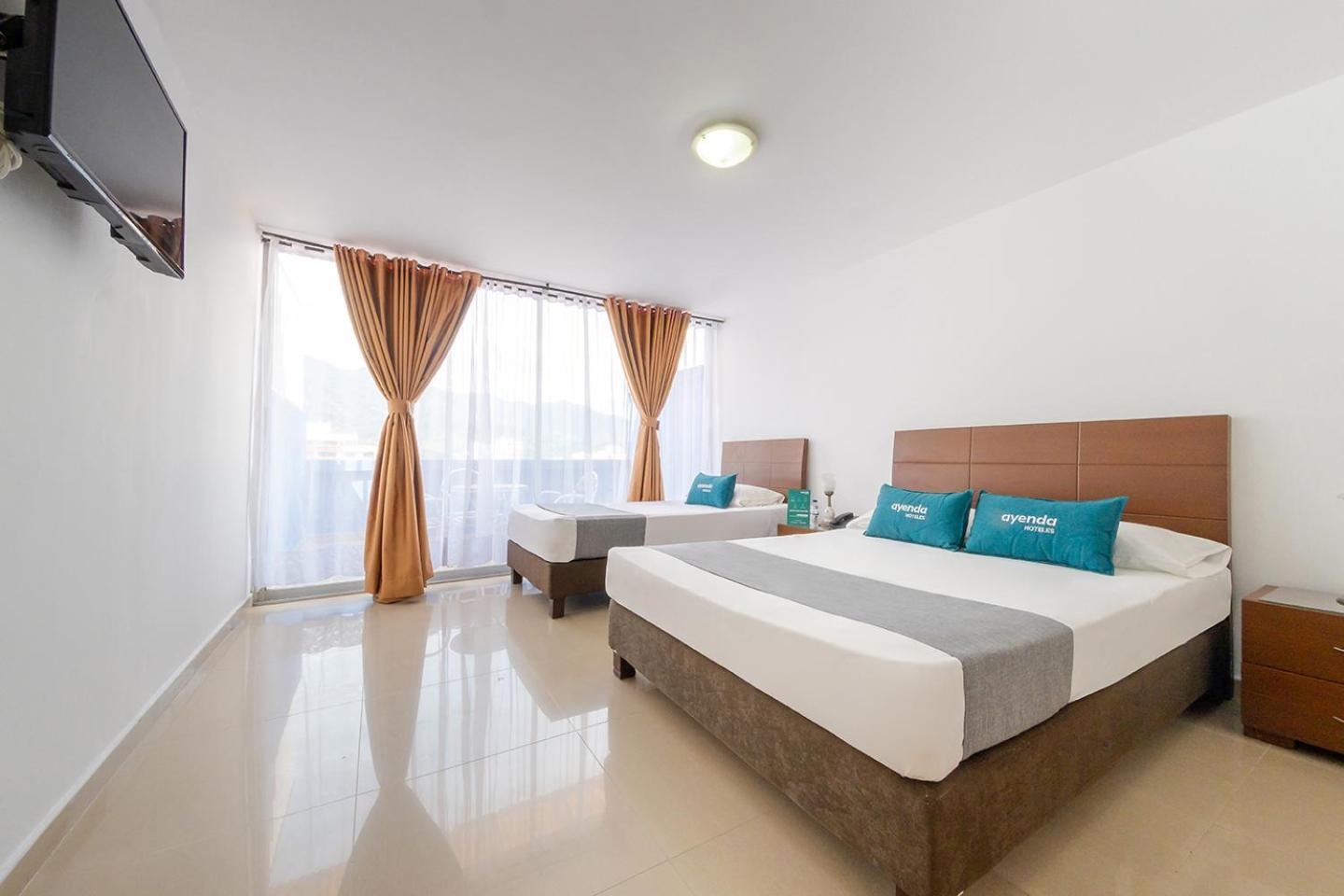 Ayenda Ambeima Hotel Ibague Bagian luar foto